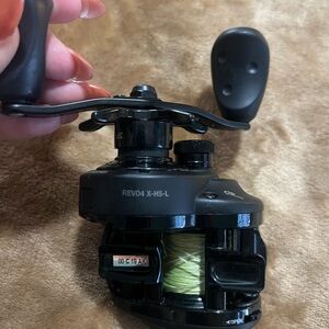 Revo Black Reel with Green Line